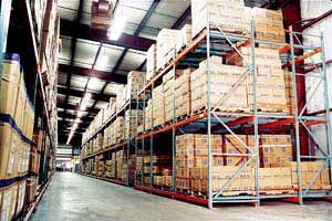 Warehouse with pushback pallet rack system